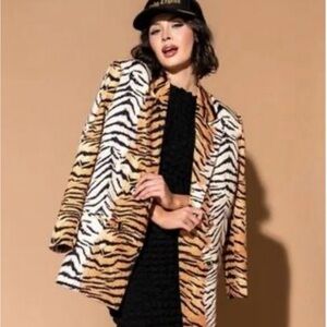 Dressed in LaLa beautiful Tiger striped boyfriend blazer. Amazing!